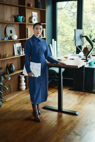 Woman standing at her desk - part of multiframe pictures